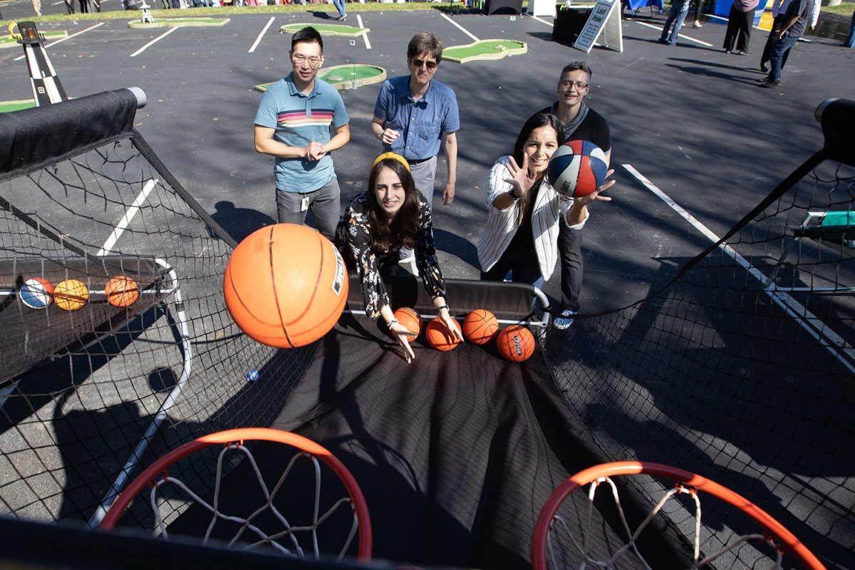 Insulet employee shooting hoops at Field Day