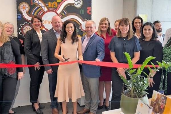 Team leaders celebrate the Australia office opening