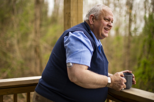 Man outside with cup