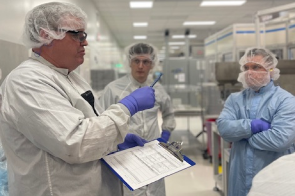 Insulet manufacturing floor with employees Dave Clancy, Brian Finn, and Pete Gowac