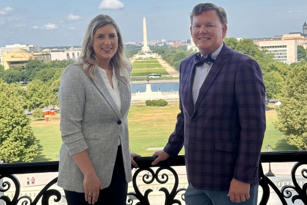 Al and Rachel standing in front of monument in Washington D.C.