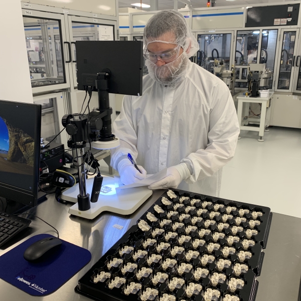 An employee at work in the R&D lab