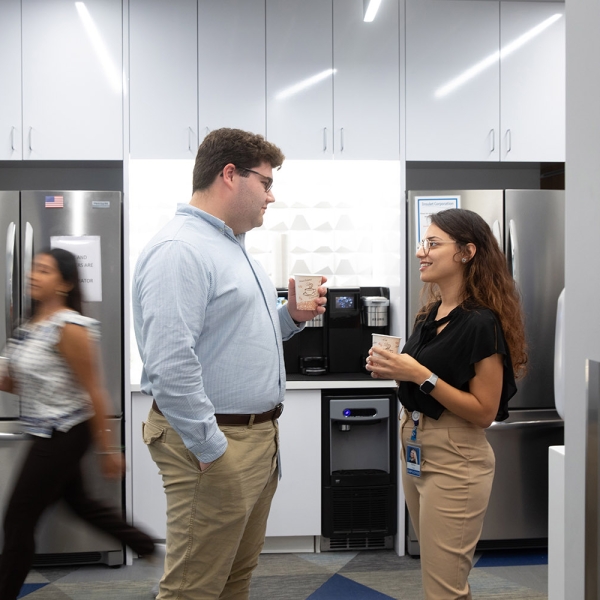 New hires meet in the break room