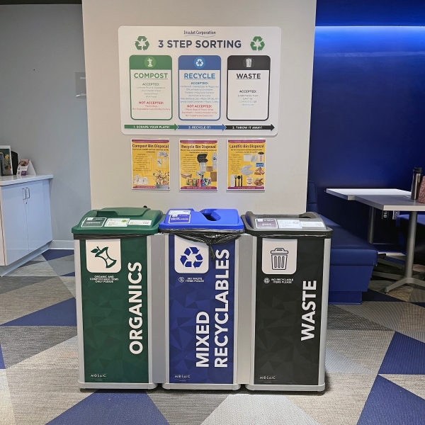 Different bins for waste, organics, and recycling at Insulet cafeteria